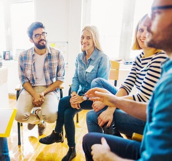 Healthy work colleagues in a group session