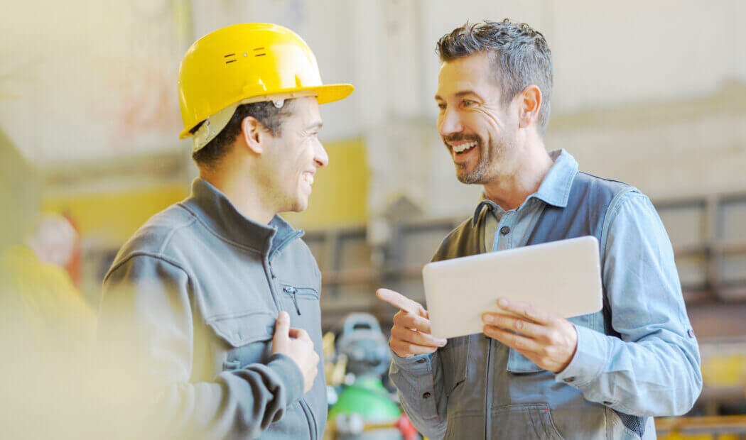 Two colleagues discussing safety at work