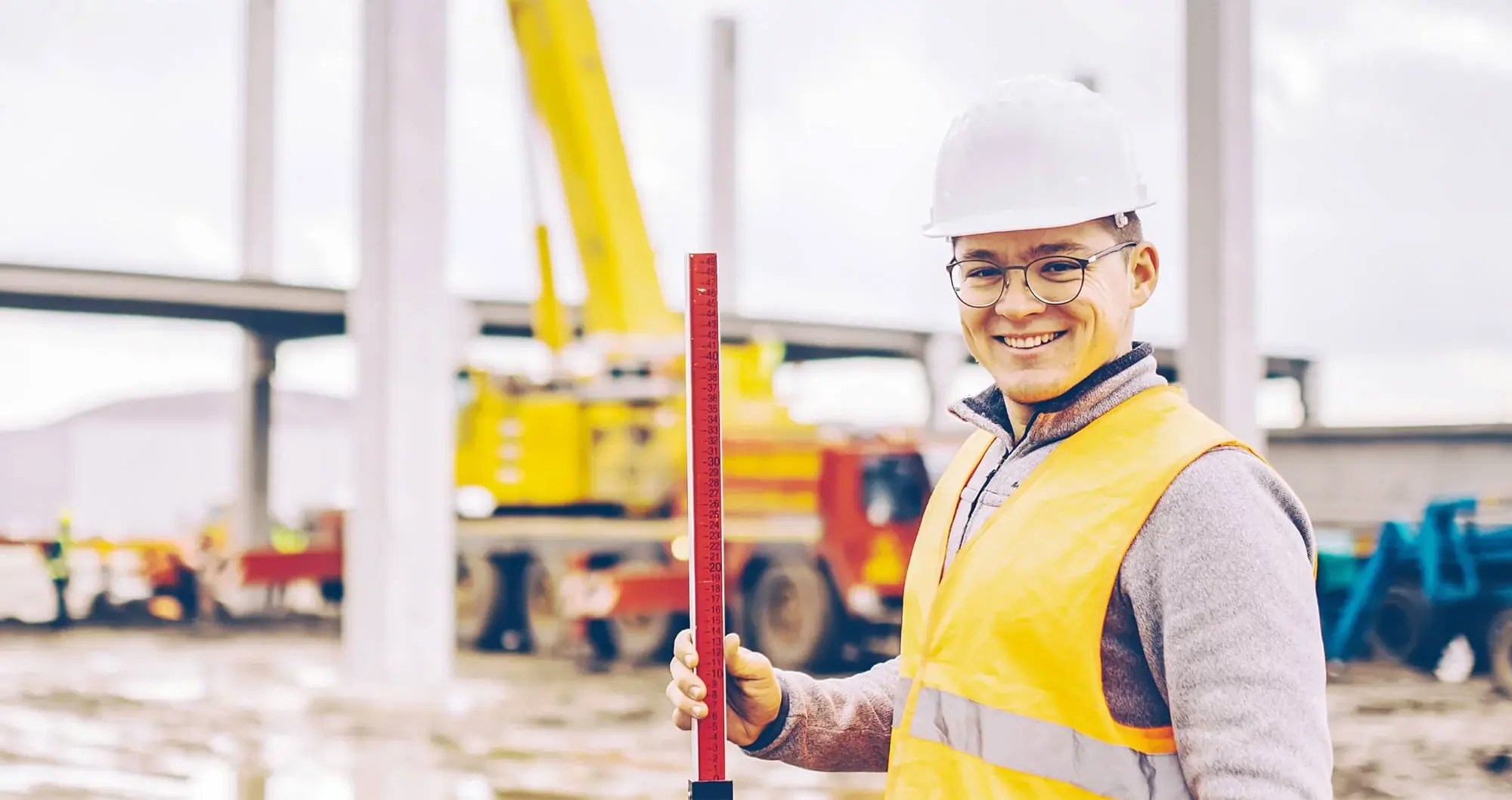 A smiling mining employee on-site