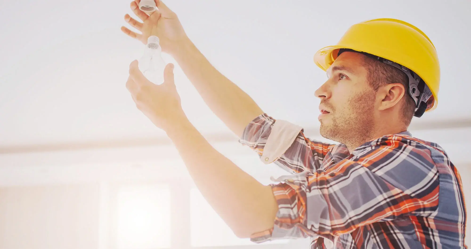 someone changing a lightbulb
