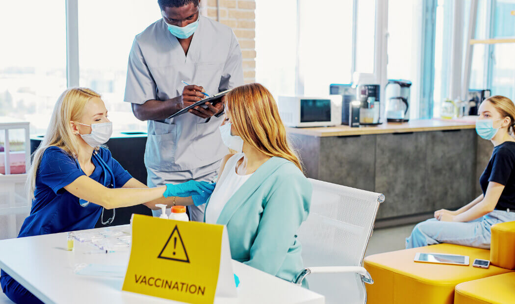 a workplace area set up as a vaccination clinic