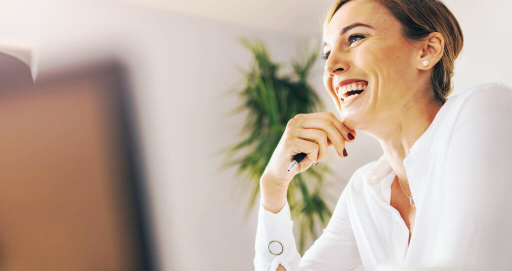 A financial services professional woman smiling