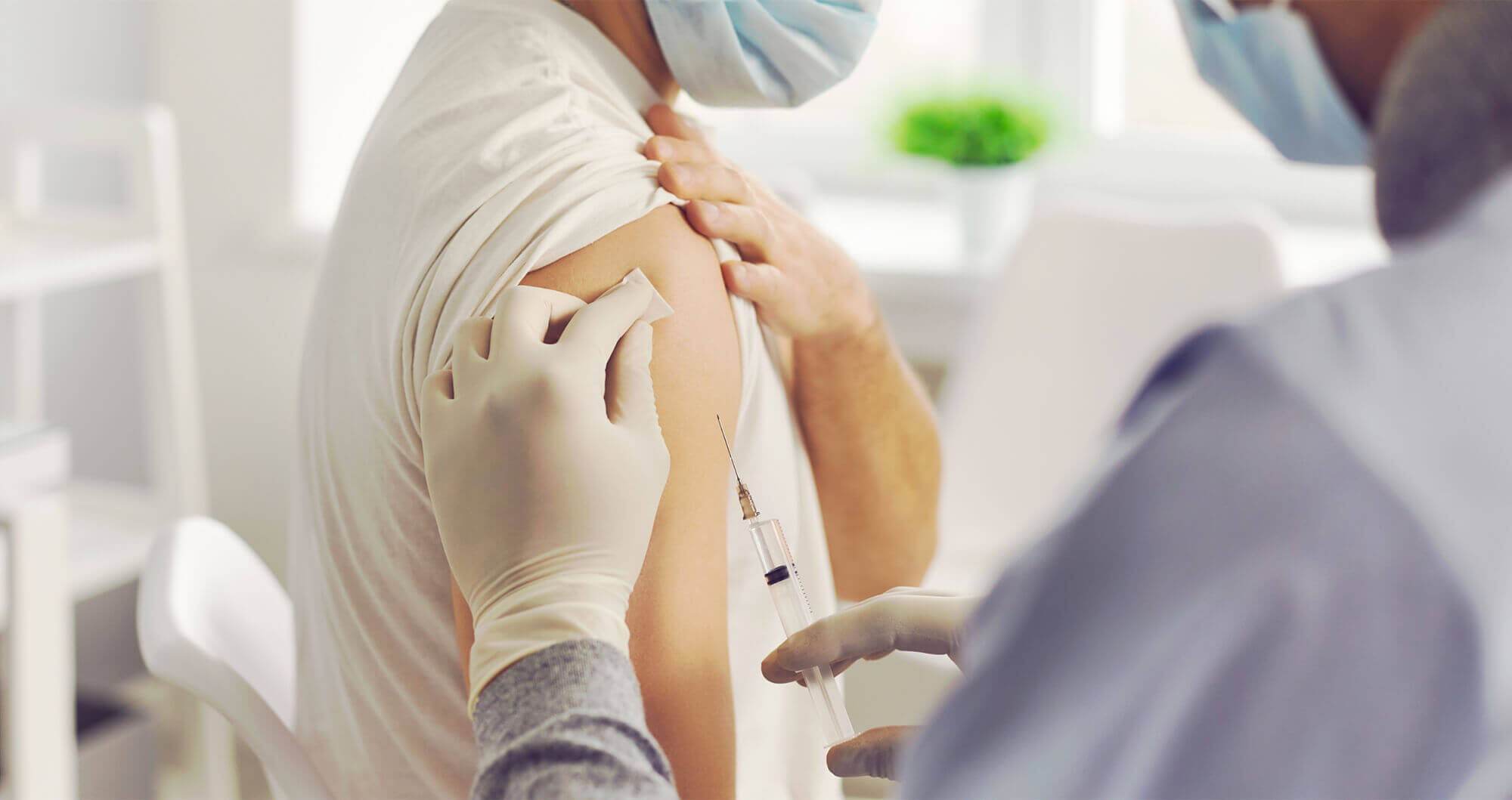 vaccination in the workplace being administered