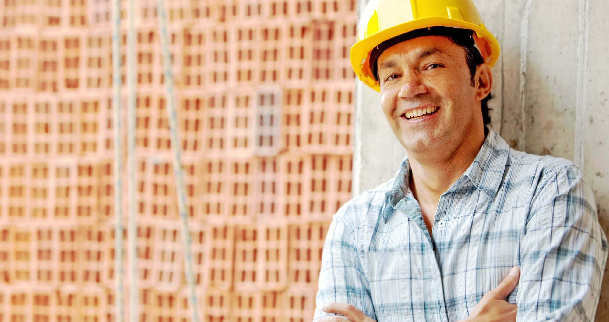 a relaxed happy looking construction worker