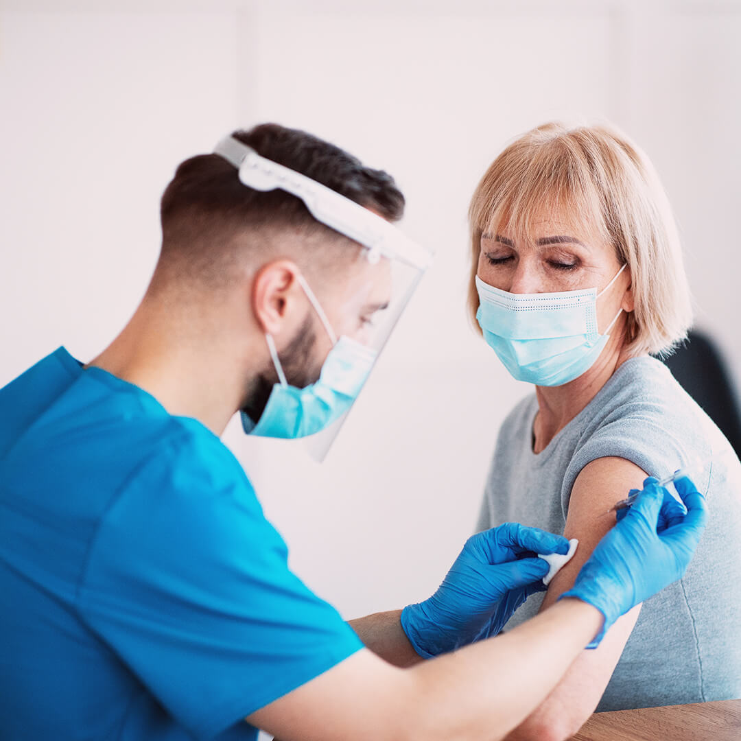 Nurse administering a vaccine